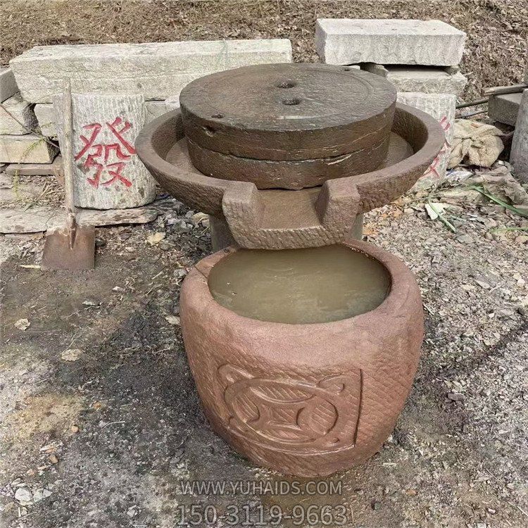 石雕磨盤，磨豆子的傳統(tǒng)設(shè)備雕塑